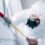 pest-control-worker-spraying-pesticides-under-wind-2021-04-05-20-04-36-utc-min